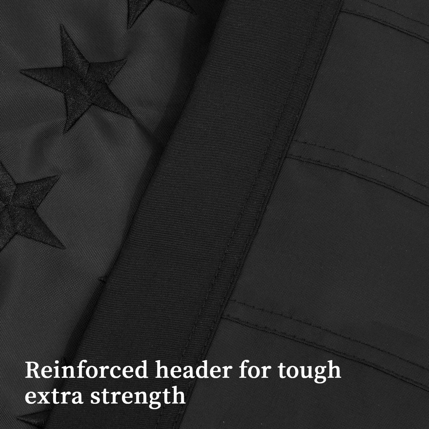 Close-up view of the 3×5 FT Embroidery All Black American Flag by Jetlifee, featuring embroidered stars and a reinforced header for added durability. Caption: "Reinforced header for tough extra strength.