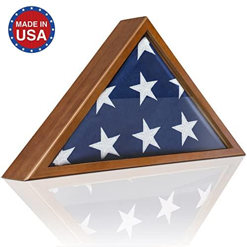 A folded American flag encased in the Jetlifee Flag Case for American Veteran Flag, a handcrafted military flag display case made of solid wood, with a "Made in USA" label visible in the top left corner.